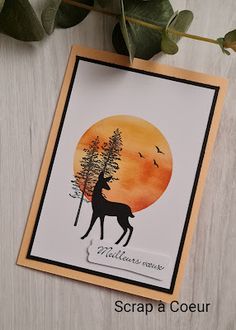 a card with an image of a deer on it