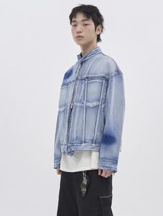 It is an oversized denim jacket with biker jacket design. The jacket is in light washed blue color with spot washed design. It has snap button tabs on the neck and hem and hidden chest pockets.- Two-way zipper closure- Snap buttons on the neck- Vertical seam point- Side pockets Casual Oversized Biker Jacket With Pockets, Denim Long Sleeve Biker Jacket For Streetwear, Casual Denim Biker Jacket For Streetwear, Spring Streetwear Stonewashed Denim Jacket, Spring Stonewashed Denim Jacket For Streetwear, Urban Denim Biker Jacket With Pockets, Oversized Urban Washed Blue Denim Jacket, Casual Blue Biker Jacket With Pockets, Light Wash Distressed Outerwear For Streetwear