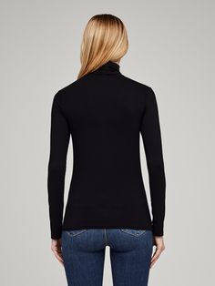 A timeless black turtleneck with full length sleeves gets a subtle sheen and smooth finish from a luxe microfiber fabrication. The slim fit compliments denim and is ideal for layering. Mock Neck Top, Black Turtleneck, Long Sleeve Turtleneck, Black Xs, Black Handle, Knitting Materials, Long Sleeve Top, Mock Neck, Sleeve Styles