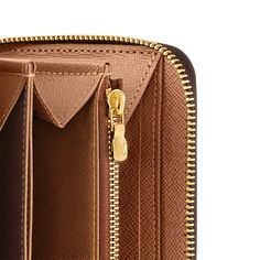 LOUIS VUITTON® - Zippy Wallet - Brown Luxury Compact Travel Wallets, Luxury Compact Wallet With Coin Pocket, Luxury Gold Wallet With Interior Card Slots, Luxury Gold Wallet For Travel, Luxury Gold Wallets For Travel, Luxury Cognac Wallet For Formal Occasions, Luxury Cognac Formal Wallet, Luxury Brown Wallet With Interior Card Slots, Luxury Wallets With Leather Lining For Daily Use