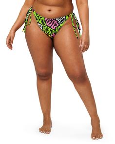 Elevate your rave style with One Stop Rave's exclusive Candy Acid Recycled String Bottoms! These mesmerizing bottoms boast a trippy print featuring the word "acid" melting in pink, green, white, and yellow hues against a bold black background. Made from soft recycled polyester with double-layering and UPF 50+ protection, these bottoms ensure both comfort and style all summer long. Join the sustainable fashion movement with these made-to-order string bottoms, reducing overproduction and making th Rave Candy, Trippy Alien, Lost Lands, Rave Style, Fashion Movement, Yellow Hues, Mini Hands, Bold Black, Upf 50