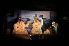 the nativity scene features three wise men riding camels