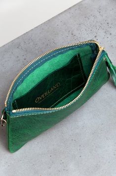 Santa Fe Bison Leather Wristlet Clutch Wallet Clutch Bags With Wrist Strap As Gifts, Coin Purse Clutch With Wrist Strap, Green Crossbody Clutch As Gift, Elegant Rectangular Coin Purse With Wrist Strap, Evening Clutch With Wrist Strap, Handheld Zipper Pouch, Travel Coin Purse Clutch, Travel Clutch Coin Purse, Evening Pouch Wallet With Zipper Closure