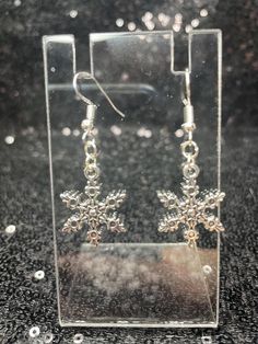 Silver snowflake charm earrings Silver Snowflakes, Charm Earrings, Halloween Shopping, Jewelry Earrings Dangle, Etsy Earrings, Dangle Drop Earrings, Dangle Earrings, Jewelry Earrings, Accessory Gift