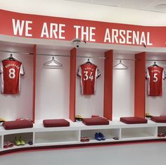 the dressing room is filled with red and white jerseys