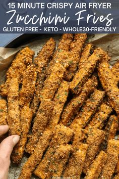 fried zucchini fries with text overlay that reads 15 minute crispy air fryer zucchini fries gluten free keto whole - friendly