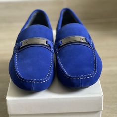 Enhance Your Casual Ensemble With The Esmail Driving Loafers From Vince Camuto. These Quality Slip-Ons Feature A Classic Moccasin Silhouette That Adds A Comfortable Accessory To Any Laid-Back Look. I Features Leather Or Suede Upper Slip-On Square Moc Toe Leather Lining Cushioned Footbed Rubber Driving Sole Imported Blue Slip-on Moccasins, Blue Textured Sole Slip-ons For Spring, Blue Flat Slip-on Moccasins, Blue Leather Slip-ons For Summer, Blue Leather Sole Slip-on Moccasins, Blue Slip-on Moccasins With Rubber Sole, Blue Slip-on Boat Shoes, Blue Casual Slip-on Loafers, Blue Slip-on Loafers With Rubber Sole