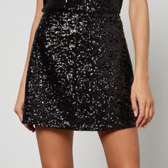 Brand New. Waist Across 14”. Length 15” Festive Mini Skirt, Embellished Black Skirt, Embellished Party Flared Skirt, Holiday Black Mini Skirt, Embellished Flared Party Skirt, Embellished Flared Skirt For Party, Festive Party Season Mini Skirt, Festive Black Sequined Skirt, Festive Black Bottoms