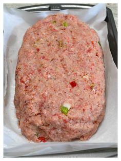 a close up of a meatloaf in a pan