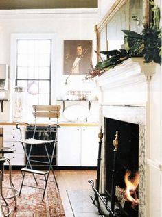 the kitchen is clean and ready to be used for cooking or baking, while also being used as a dining room