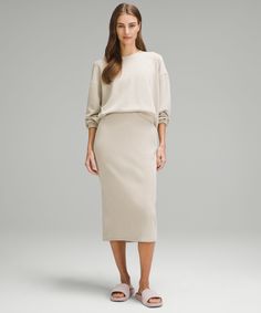 Feel it to believe it. From running errands to relaxed nights in, this lounge-worthy midi skirt dials up the softness. Designed for Casual. Hits below the knee to just above the ankle:Slim fit skims your body. Hand pockets with hidden card sleeve. Cream Lined Midi Skirt, Feminine Cream Midi Skirt, Chic Non-stretch Beige Skirt, Fall Beige Midi-length Skirt, Non-stretch Beige Midi Skirt, Tennis Shop, Women Skirts Midi, Skirt Design, High Rise