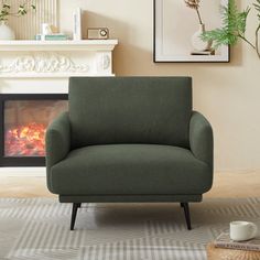 a green chair sitting in front of a fire place