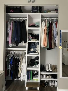 the closet is full of clothes, shoes and other things to put in it's storage area