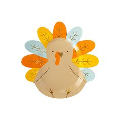 a paper plate with a turkey design on the front and leaves on the back that are yellow, orange, blue, and green