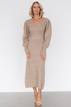 Your new go to sweater dress that is cozy and warm for the season! Light latte color Knit material with plenty of stretch V-neckline Long bubble sleeves with fitted cuffs Flattering waistband and sleeve seam details Chic straight silhouette Unlined - perfect for dressing up or down 52% Polyester, 42% Acrylic, 3% Elastine, 3% Wool Trina is 5'6, cup size 32D, size 2 and is wearing size S V Neck Sweater Dress, Cocktail Jumpsuit, Destination Dress, Baltic Born, Romper Outfit, Velvet Fashion, Cup Size, Holiday Fashion, V Neck Sweater