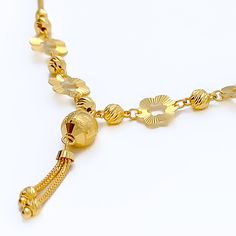 This 22k gold necklace, with a weight of 9.1 grams, showcases a charming cutwork flower design, beautifully rendered in a gleaming yellow gold finish. The necklace spans 17 inches in length, featuring a drop of 1.25 inches, and comes with 1 inch of adjustable links for a tailored fit, secured by an S lock. The intricate cutwork adds a touch of delicacy and elegance, making this piece perfect for those who appreciate the beauty of floral motifs combined with the luxurious appeal of gold. Ideal for adding a sophisticated and feminine touch to any outfit, this necklace is a testament to exquisite craftsmanship and timeless style. PRODUCT DETAILS Gold Purity(karat): 22k Gold Weight(grams): 9.1 Item Finish: Yellow Gold Necklace Length: 17" Drop Length: 1.25" Adjustable Links: 1" Links Lock Styl 22k Gold Necklace, Yellow Gold Necklace, Floral Motifs, Cut Work, 22k Gold, Necklace Length, Flower Design, Floral Motif, Timeless Style