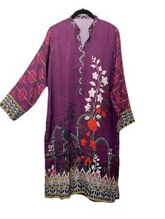 "Color: Dark Magenta Material: Blended Silk Size: L Theme: Floral printed MEASUREMENT: Size for Large: Chest : 46\" Hips : 50\" Length: 40\" Sleeves: 21\" --------------------------------------------------------------- Detailed Description: Simple's blended silk kurti. Make your ethnic casuals make look uber stylish with our floral kurta crafted in blended silk fabric. It is a must-have for any and every occasion. From intimate gatherings to traditional rituals, this dark magenta kurta is a must V-neck Floral Print Kurta For Eid, Eid Floral Print V-neck Kurta, V-neck Kurta With Printed Motifs For Eid, Eid V-neck Kurta With Printed Motifs, Summer Silk Kurta With Digital Print, Traditional V-neck Printed Kurta, Printed Silk Kurta For Festive Occasions, Festive Printed Silk Kurta, Festive Silk Kurta With Digital Print