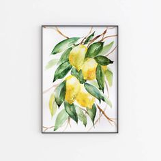 a watercolor painting of lemons hanging on a wall