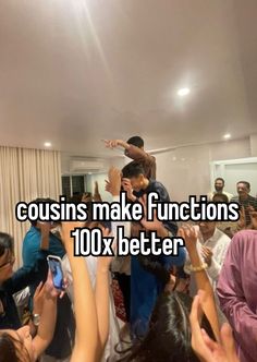 people in a room with their hands up and the words coursins make functions 100x better