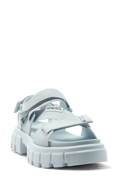 A sneaker-inspired sandal features adjustable webbing straps for the perfect fit, while an iconic lugged sole offers stability while you're out and about. 2" heel; 1 1/2" platform (size 8.5) Textile upper and lining/rubber sole Imported Spring Sport Sandals With Lug Sole, Spring Synthetic Sport Sandals With Lug Sole, Casual Synthetic Sandals With Lug Sole, Trendy Platform Sport Sandals For Streetwear, Casual Sport Sandals With Lug Sole For Spring, Casual Spring Sport Sandals With Lug Sole, Casual Sandals With Lug Sole For Streetwear, Trendy Open Toe Sport Sandals For Streetwear, Casual Strapped Platform Sandals