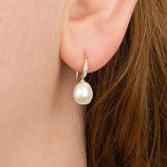 Guaranteed to add a touch of sparkle to any look, our natural diamond and Keshi pearl drop earrings are crafted from the finest 9ct yellow gold. Our baroque Keshi pearls are unique in shape and colour so every single earring will be different! These dainty gold drop earrings feature a classic hook fastening and are suitable for almost any age. A lovely Christmas gift, stocking filler or for a birthday treat for anyone born in April or June. A wonderfully thoughtful way to mark a milestone birthd Fine Jewelry Akoya Pearl Pear-shaped Earrings, Fine Jewelry Akoya Pearl Pear Earrings, Teardrop Pearl Pendant Earrings In Yellow Gold, Fine Jewelry Teardrop Earrings With Pearl Pendant, Yellow Gold Teardrop Pearl Pendant Earrings, Teardrop Pearl Earrings Fine Jewelry, Pear-shaped Pearl Drop Diamond Earrings, Pear-shaped Diamond Earrings With Pearl Drop, Oval Pearl Drop Fine Jewelry Earrings