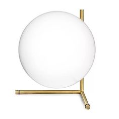 a white ball and gold stand on a white background