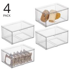 four clear storage bins with lids for shoes and other items, each containing two pairs of slippers