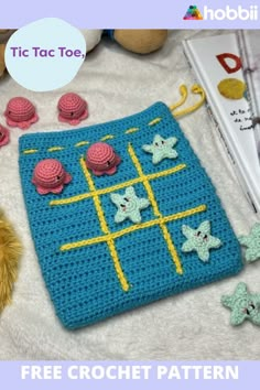 a crochet pattern for a tic - tac toe board game with buttons