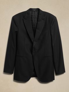 Timeless tailoring, this exquisite black tuxedo jacket offers elevated style to last a lifetime.  Made from Italian virgin wool, our designers employed a classic Barathea weave, a sharp roped shoulder construction and our tailored slim fit for a natural look that's especially polished.  Ottoman pockets finish the look with understated sophistication.  TAILORED SLIM FIT: More relaxed than our Slim Fit, our designers spent 3 years to refine the fit of this Italian cut, with a slightly softer shoul Italian Tuxedo, Black Tuxedo Jacket, Elevated Style, Black Tuxedo, Peak Lapel, Tuxedo Jacket, Italian Style, Things To Buy, Banana Republic