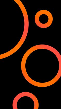 an orange and black background with circles