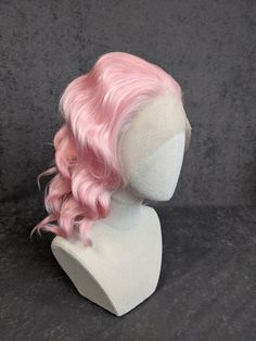 CLEARANCE SALE! MUST END THIS WEEKEND! COLOUR: Candy pink STYLE: Medium length beach waves DENSITY: Our wigs are super-dense to give you a lavish head of full hair. Made with an advanced synthetic fibre, these wigs guarantee you a full head of silky hair! ULTRA HD LACEFRONT: Made from the softest Swiss Lace available on the market, our lacefronts are truly unclockable! All our wigs come with roughly 1 to 2 inches of parting space with individually-tied hairs. SIZE: Our wigs are equipped with Sur Medium Length Beach Waves, Lacefront Wig, Full Hair, Pink Style, Swiss Lace, Candy Pink, New Years Sales, Silky Hair, Cosplay Wig