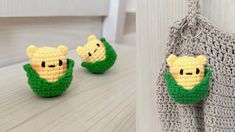 crocheted keychain with two small items attached to it, one is wearing a green shirt and the other has a yellow teddy bear