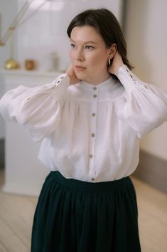 Step into the pages of history with our Edwardian Linen Blouse, a tribute to the refined elegance of the early 20th century. The attention to detail and vintage-inspired design make this band collar shirt a standout piece for those who appreciate the grace of historical fashion. This Victorian blouse with puff sleeves is a work of art, bringing together the best of peasant aesthetics and modern comfort.  Whether you're a history enthusiast or a bookish soul, our Dark Academia shirt suits for eve Classic Lantern Sleeve Tops For Daywear, Classic Bishop Sleeve Blouse With Button Cuffs, Classic Bishop Sleeve Tops For Daywear, Classic Tops With Bishop Sleeves For Daywear, Classic Blouse With Bishop Sleeves And Button Cuffs, Classic Bishop Sleeve Blouse For Daywear, Classic Blouse With Bishop Sleeves For Daywear, Classic Blouse With Bishop Sleeves, Classic Blouse With Gathered Bishop Sleeves