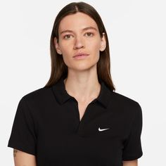 Upping your style is a cinch in the Nike Essential Women's Crop Polo Top. With its cropped cut, you get that little bit of sass. And because it has the styling of a polo, you get that hint of sophistication as well. Short-sleeved. V-neck. Crop top. Material: 97% Cotton, 3% Spandex. Machine washable, tumble dry. Nike Classic Fitted Tops, Classic Fitted Nike Tops, Look Clean, Nike Polo, Women's Sportswear, Cotton Jersey Fabric, Polo Top, Swoosh Logo, Sportswear Women