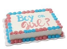 a birthday cake with the words boy or girl on it and blue, pink, and white icing