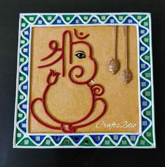 an artisticly designed card with the word ganesh on it