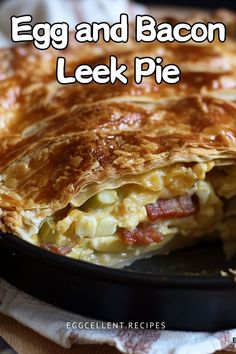 an egg and bacon leek pie on a plate with the words egg and bacon leek pie