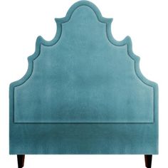 an upholstered headboard with wooden legs and a blue velvet finish on the frame