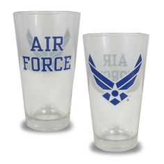 two shot glasses with air force logos on them