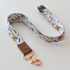 This item takes your favorite hobby – coloring – and adds the functionality of a lanyard. What's not to love? Use it to hold your keys, ID and more.if you could see it IRL: 19" long, 0.75" wide full-color lanyard. Includes breakaway safety clasp and gold lobster claw clasp. Lockhart Texas, Print Journal, Fabric Lanyard, Pennant Flags, Color Crayons, Cute Accessories, Mug Art, Favorite Hobby, Cute Packaging