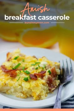 an easy breakfast casserole with bacon and green onions on a white plate next to a glass of orange juice