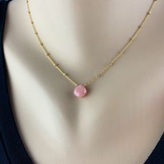 "Gold Opal Necklace Minimal Necklace October Necklace Delicate Necklace Simple Gold Necklace Pink Jewelry Women Necklace Best Friend Necklace Step up your everyday jewelry with a Pink Opal Pendant necklace. The faceted Pink Opal catches the light with every move and looks great with dressy or casual outfits. We have hand wrapped each stone with either 14K Gold-Filled, Sterling Silver or Oxidized Sterling Silver Wire before adding it to the Satellite Chain in coordinating materials. The chain is Dainty Pink Charm Necklace With Delicate Chain, Feminine Round Pendant Jewelry Gift, Feminine Pendant Jewelry Gift, Feminine Rose Gold Necklace With Adjustable Chain, Elegant Pink Chain Necklace With Delicate Chain, Delicate Adjustable Faceted Necklace, Elegant Pink Charm Necklaces With Delicate Chain, Dainty Pink Charm Necklace With Adjustable Chain, Delicate Pendant Crystal Necklace With Clavicle Chain