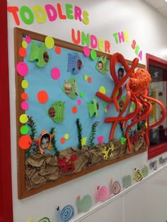 a birthday cake decorated with an octopus and sea life theme for a child's birthday