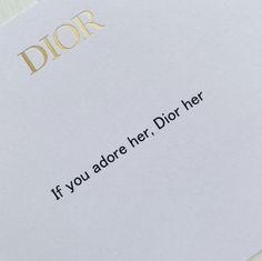 a close up of a piece of paper with the words dior written on it