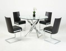 a glass table with four chairs around it