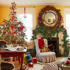 a living room decorated for christmas with a tree