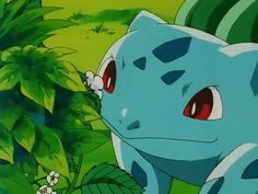 a blue pokemon with red eyes standing in front of green plants and flowers on a sunny day