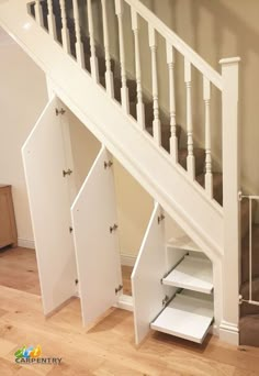 a stair case under the stairs in a house