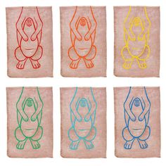 four different colored images of animals on towels