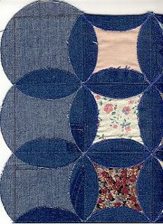 a piece of fabric with several circles on it and a flowered pillow in the middle